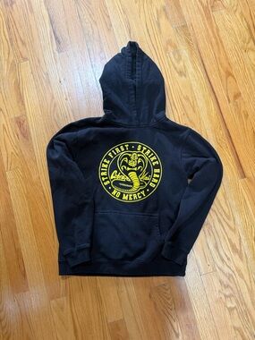 Black Hoodie with Yellow Cobra Kai Graphic